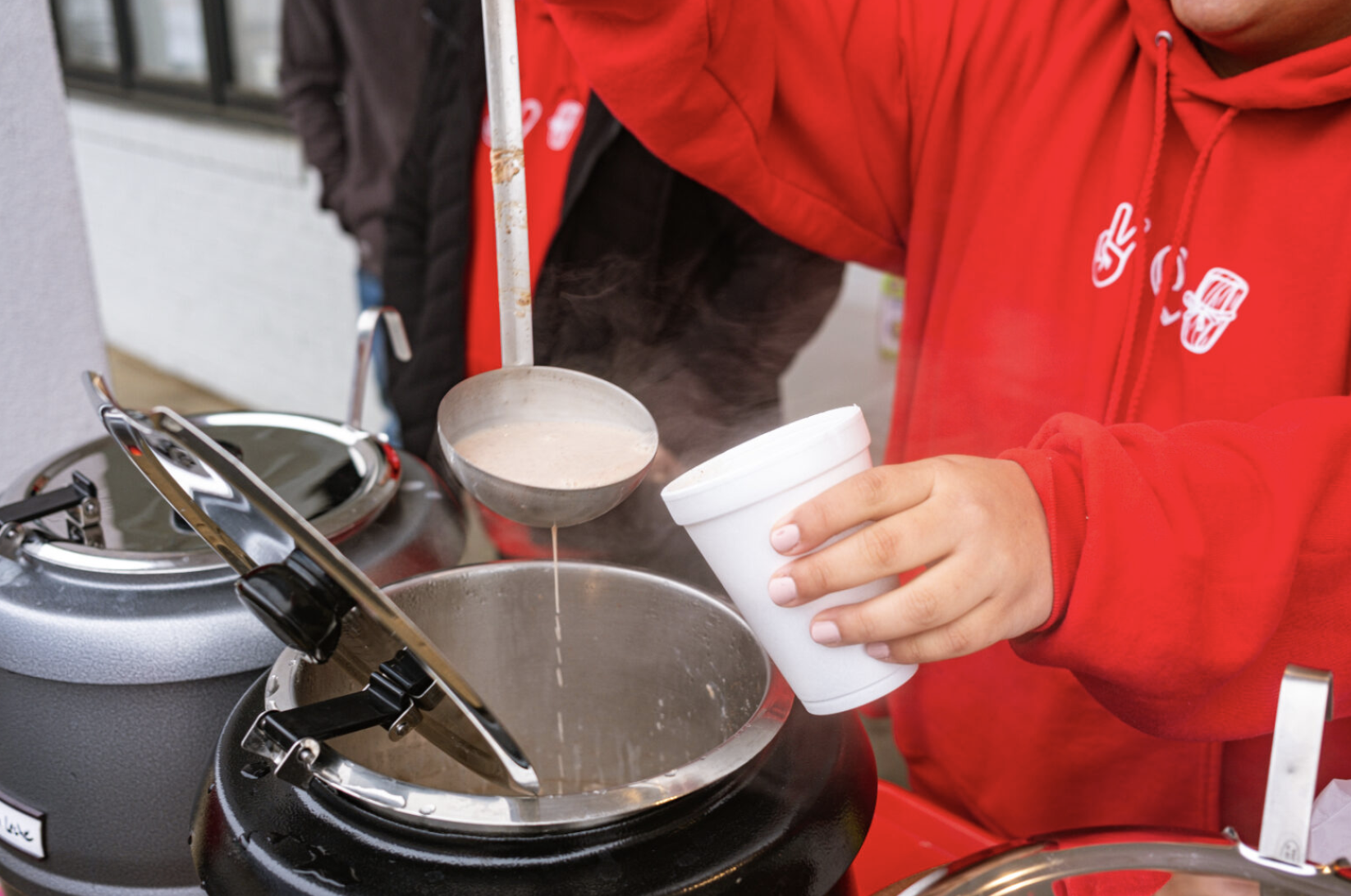 atole being poured